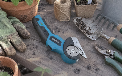 BoxHound cutter on a garage shelf with yard supplies