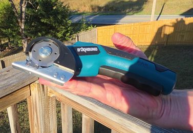 Customer holding the BoxHound cutter out on the deck