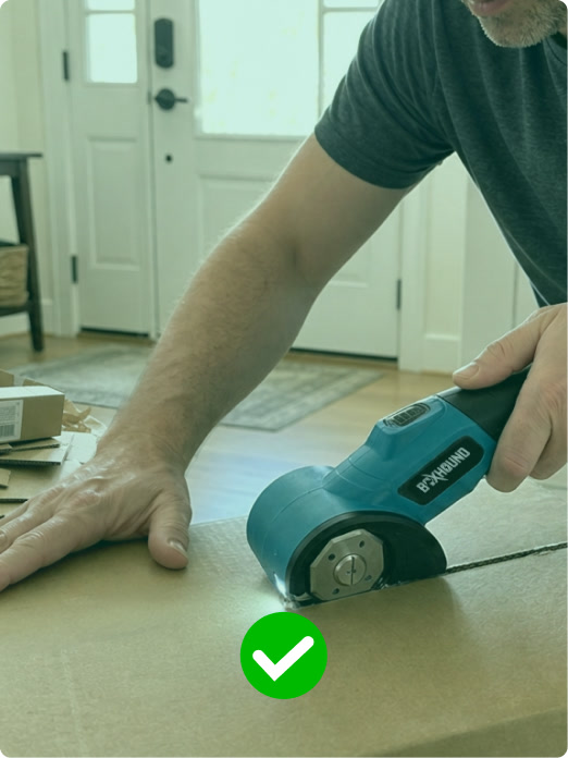 Slicing a box flat with the BoxHound electric box cutter